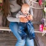 Close-up of mother and her baby boy indoors